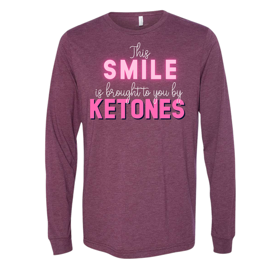 ketones shirt Unisex shirt with "This smile is brought to you by Ketones" text design.