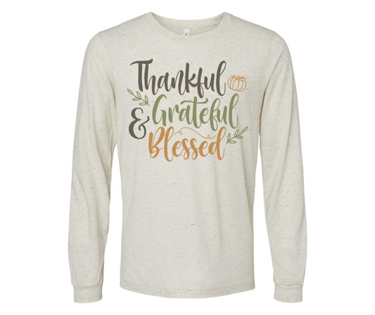 Thanksgiving Shirt with "Thankful & Grateful Blessed" design, long-sleeve and festive.