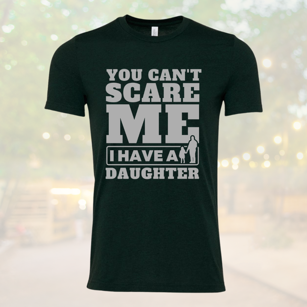 Girl Dad Shirt with "You Can't Scare Me I Have A Daughter" slogan in black.